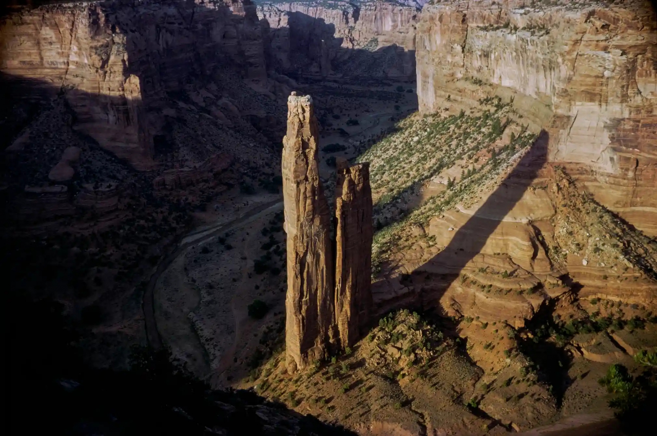 Rock-Mountain-August-1977-Spider-Rock-in-the-Canyon-de-Chelly-Arizona-casts-its-shadow-over-the-strata-beneath[1].jpg