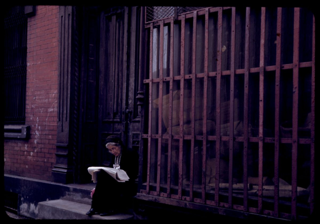 Old-lady-reads-Sunday-paper.-Lower-East-Side-N.Y.C.-1942-1200x840.jpeg